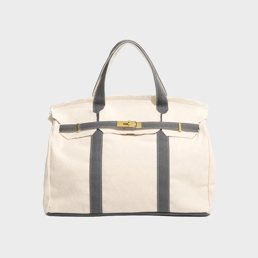 Vintage linen canvas tote bag featuring reinforced handles and a secure snap closure, perfect for stylish and eco-friendly shopping or daily use. 4