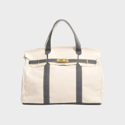 Vintage linen canvas tote bag featuring reinforced handles and a secure snap closure, perfect for stylish and eco-friendly shopping or daily use. 4
