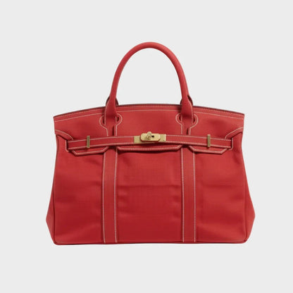Vintage linen canvas tote bag featuring reinforced handles and a secure snap closure, perfect for stylish and eco-friendly shopping or daily use. 10
