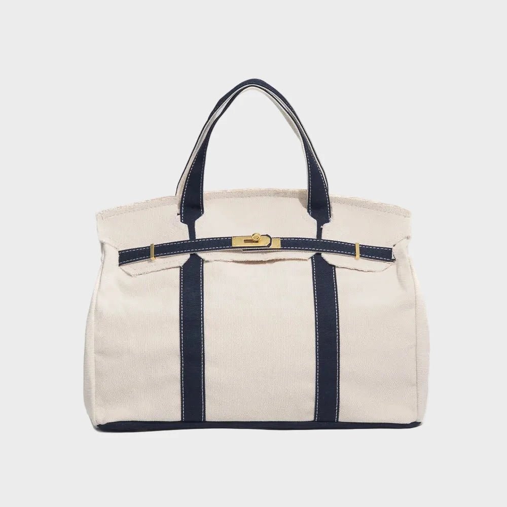 Vintage linen canvas tote bag featuring reinforced handles and a secure snap closure, perfect for stylish and eco-friendly shopping or daily use. 0