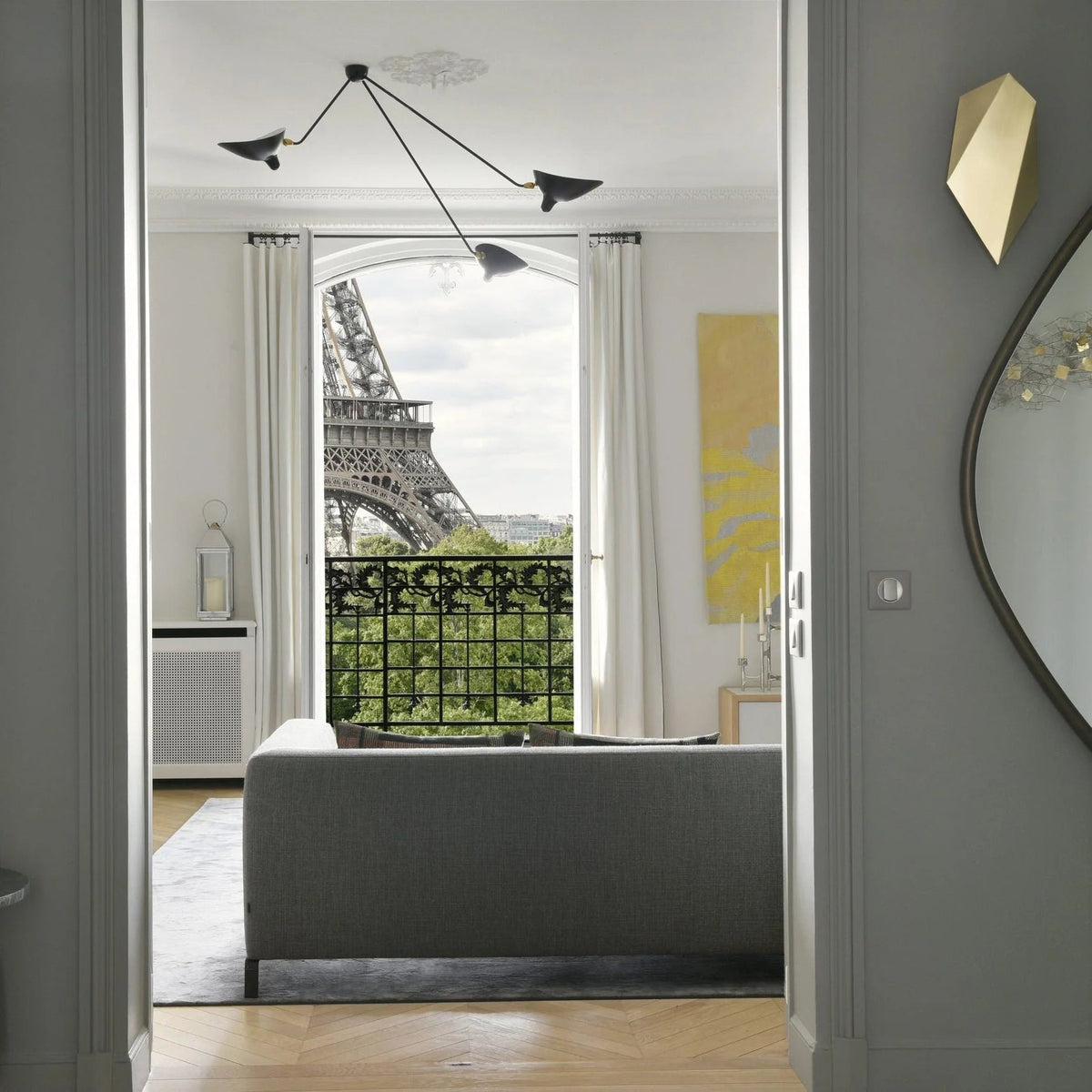 Vintage pendant light featuring 3 or 5 lights, designed with lacquered black metal arms and elegant brass accents, ideal for adding a stylish touch to 6