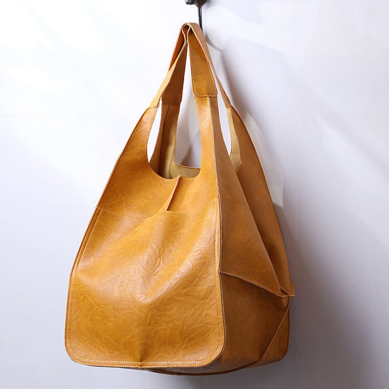 Vintage leather tote bag, featuring an elegant design and durable construction, perfect for everyday use with a spacious interior for all your essentials. 0