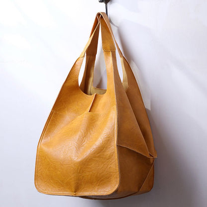 Vintage leather tote bag, featuring an elegant design and durable construction, perfect for everyday use with a spacious interior for all your essentials. 0