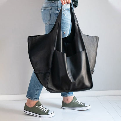 Vintage leather tote bag, featuring an elegant design and durable construction, perfect for everyday use with a spacious interior for all your essentials. 9