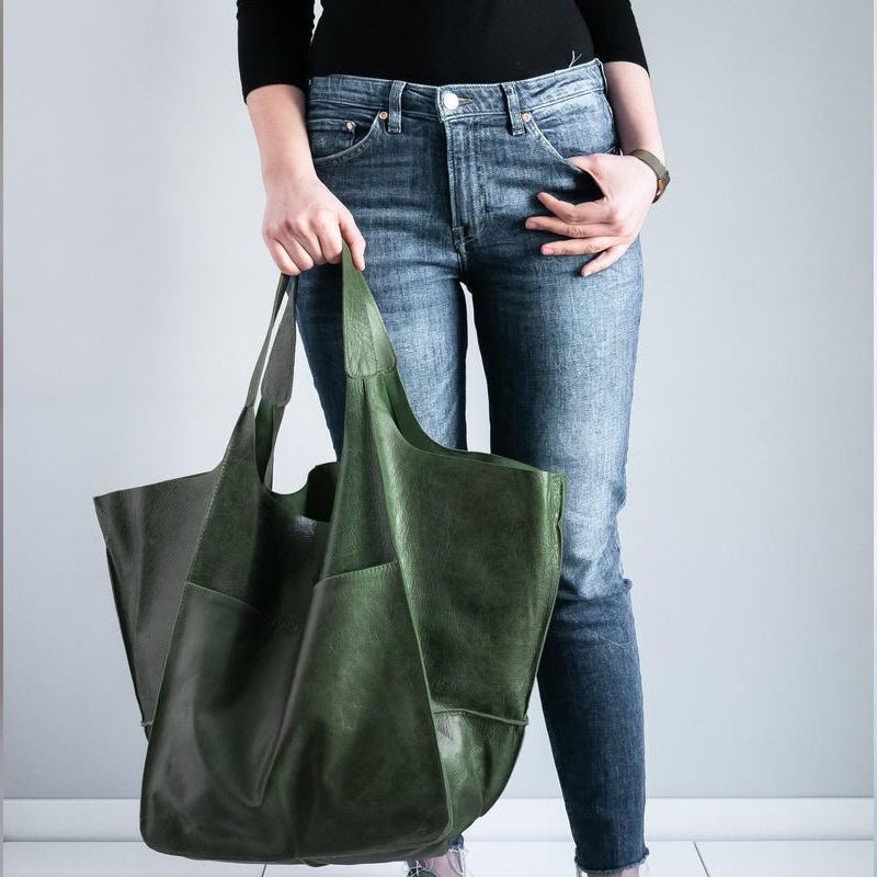 Vintage leather tote bag, featuring an elegant design and durable construction, perfect for everyday use with a spacious interior for all your essentials. 10
