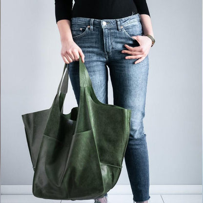 Vintage leather tote bag, featuring an elegant design and durable construction, perfect for everyday use with a spacious interior for all your essentials. 10