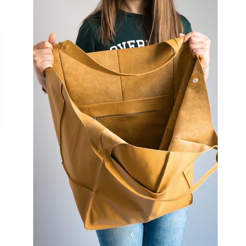 Vintage leather tote bag, featuring an elegant design and durable construction, perfect for everyday use with a spacious interior for all your essentials. 7