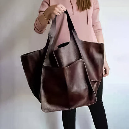Vintage leather tote bag, featuring an elegant design and durable construction, perfect for everyday use with a spacious interior for all your essentials. 13