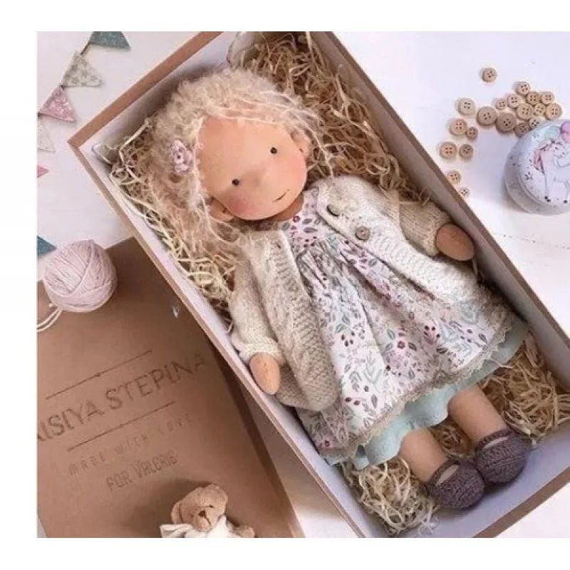 Waldorf-style cotton cuddly toy in a fabric box, featuring a soft plush doll designed for creative play and imaginative adventures. 11
