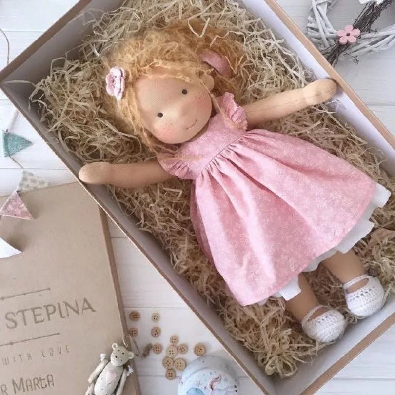 Waldorf-style cotton cuddly toy in a fabric box, featuring a soft plush doll designed for creative play and imaginative adventures. 19