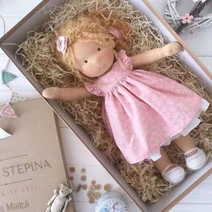Waldorf-style cotton cuddly toy in a fabric box, featuring a soft plush doll designed for creative play and imaginative adventures. 19
