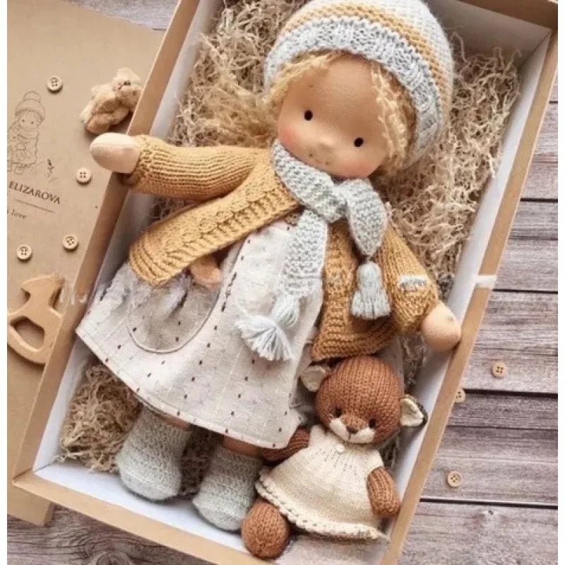 Waldorf-style cotton cuddly toy in a fabric box, featuring a soft plush doll designed for creative play and imaginative adventures. 32