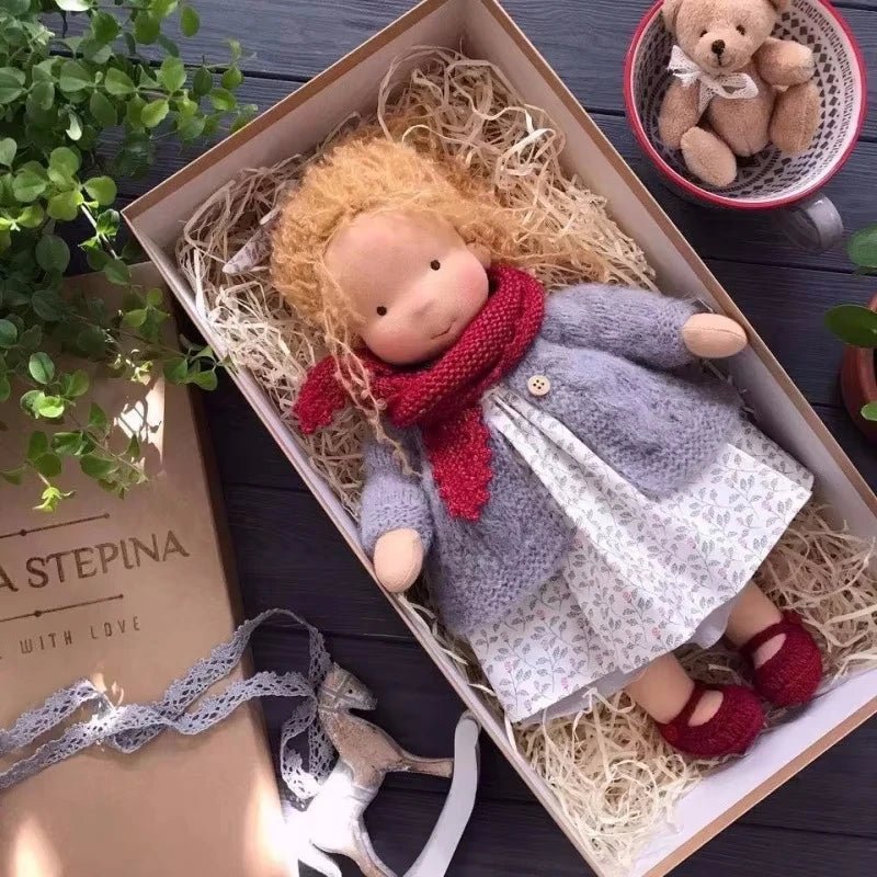 Waldorf-style cotton cuddly toy in a fabric box, featuring a soft plush doll designed for creative play and imaginative adventures. 3
