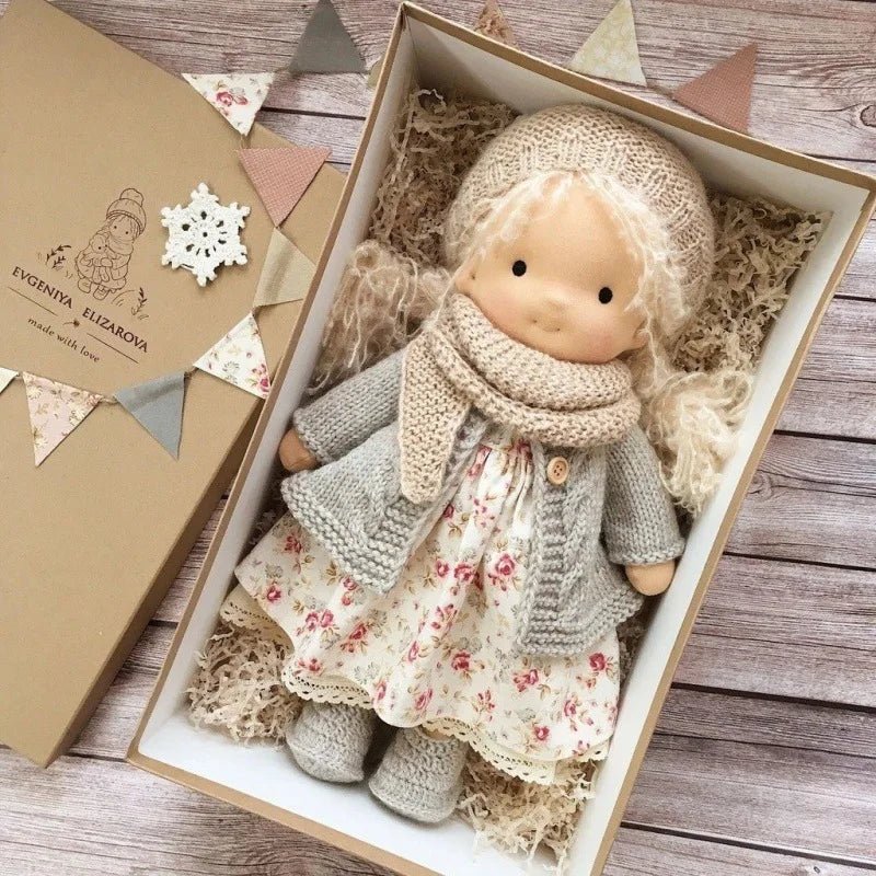 Waldorf-style cotton cuddly toy in a fabric box, featuring a soft plush doll designed for creative play and imaginative adventures. 24