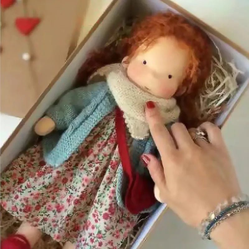 Waldorf-style cotton cuddly toy in a fabric box, featuring a soft plush doll designed for creative play and imaginative adventures. 27