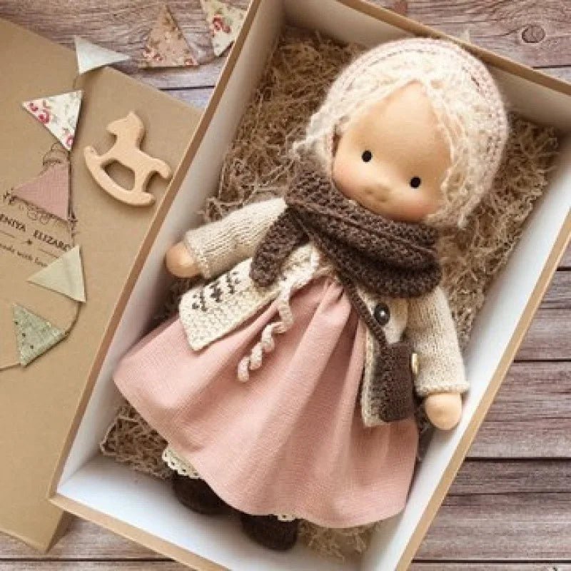 Waldorf-style cotton cuddly toy in a fabric box, featuring a soft plush doll designed for creative play and imaginative adventures. 10