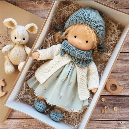 Waldorf-style cotton cuddly toy in a fabric box, featuring a soft plush doll designed for creative play and imaginative adventures. 35