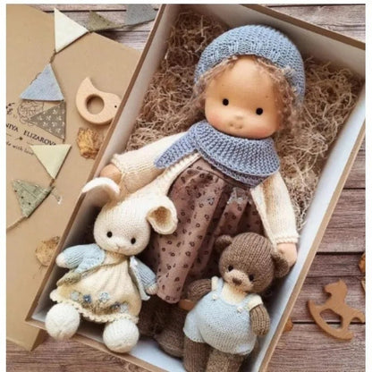 Waldorf-style cotton cuddly toy in a fabric box, featuring a soft plush doll designed for creative play and imaginative adventures. 14