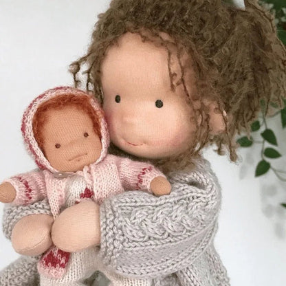 Waldorf-style cotton cuddly toy in a fabric box, featuring a soft plush doll designed for creative play and imaginative adventures. 6