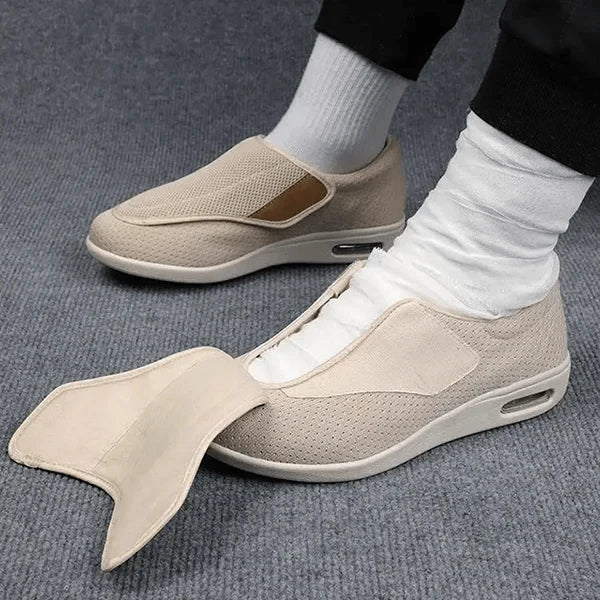 Walking shoes for diabetics featuring pressure relief technology and a wide fit design, shown in a stylish beige color, ideal for all-day comfort and support. 0