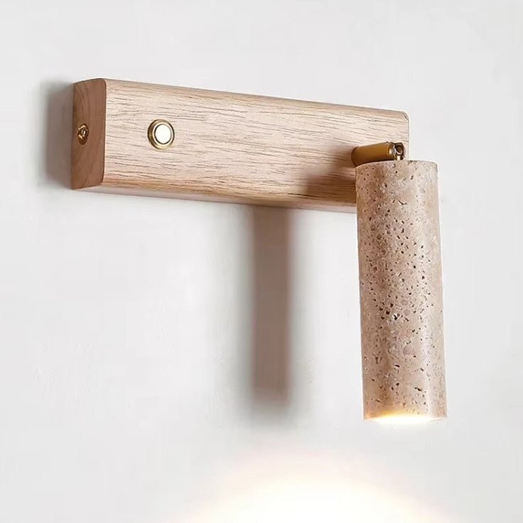 Wall lamp featuring an adjustable spotlight and crafted from natural travertine, showcasing a warm minimalist design ideal for modern interiors. 4