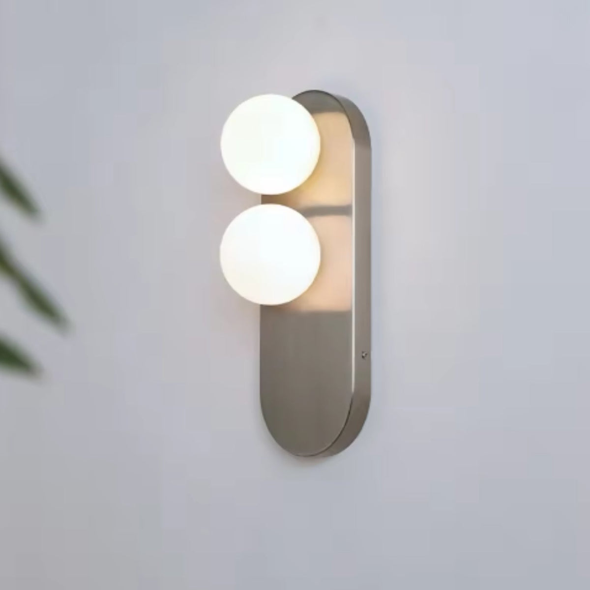 Modern vertical wall sconce featuring frosted glass globes and a sleek brushed nickel finish, perfect for contemporary home decor. 5