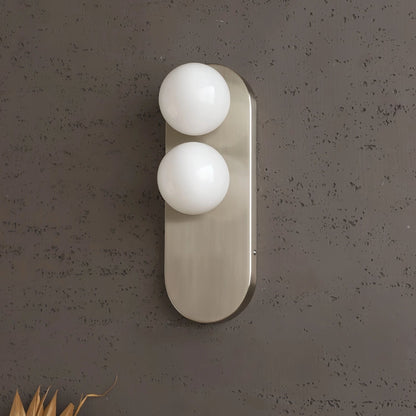 Modern vertical wall sconce featuring frosted glass globes and a sleek brushed nickel finish, perfect for contemporary home decor. 4