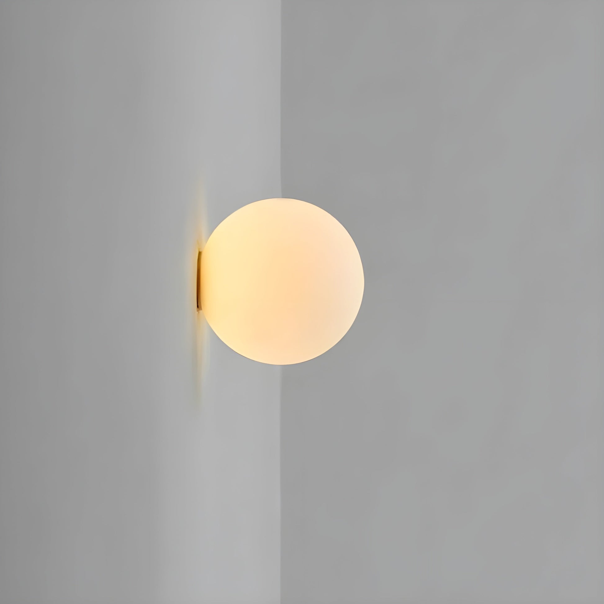 Modern minimalist wall lamp featuring a frosted glass shade for soft light distribution, ideal for enhancing contemporary interiors. 8