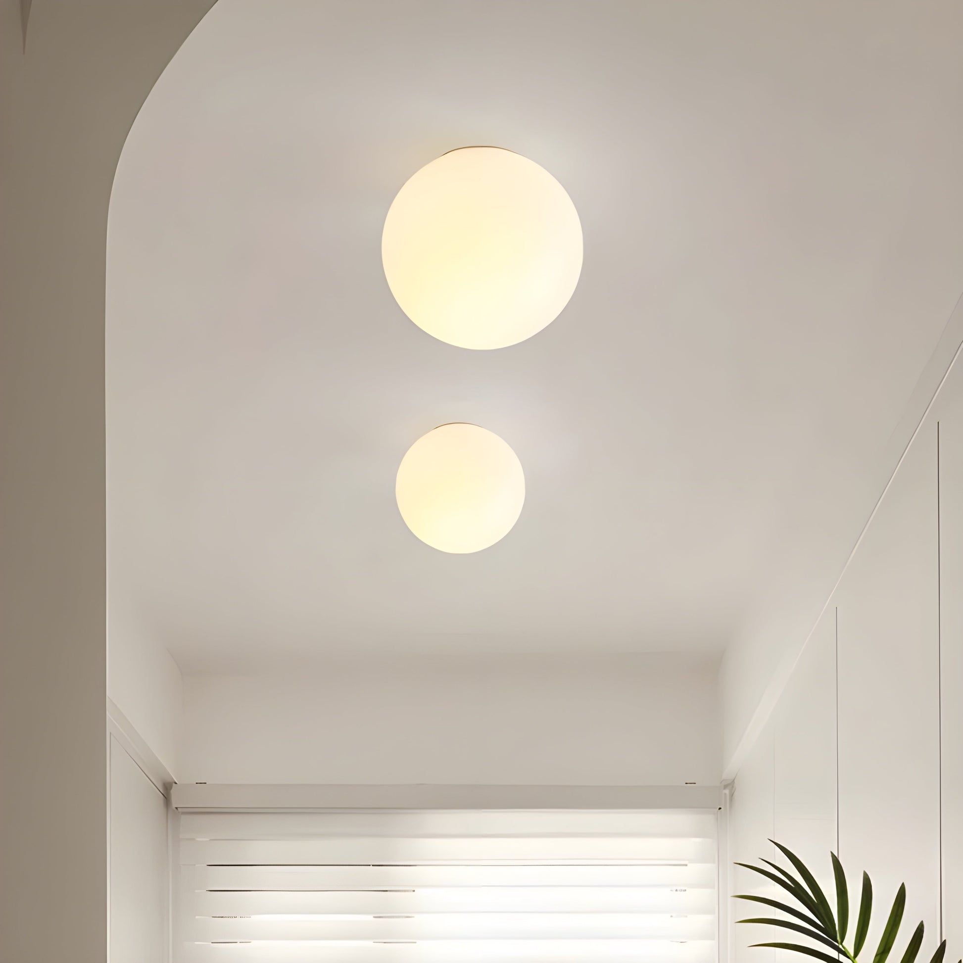 Modern minimalist wall lamp featuring a frosted glass shade for soft light distribution, ideal for enhancing contemporary interiors. 4
