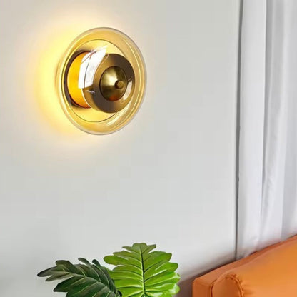 Wall lamp featuring integrated LED technology and elegant amber glass, designed for compact decorative lighting in modern interiors. 2
