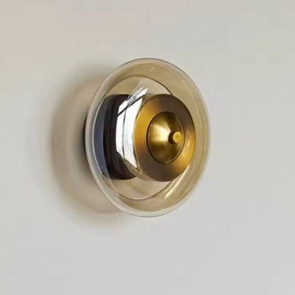 Wall lamp featuring integrated LED technology and elegant amber glass, designed for compact decorative lighting in modern interiors. 5