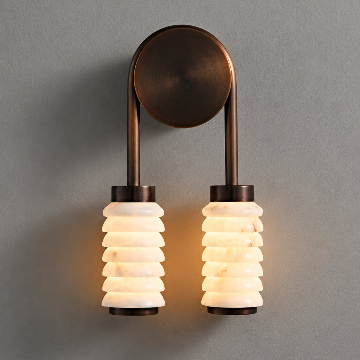 Wall lamp featuring elegant ribbed marble shades and a vintage antique metal frame, designed with a dual-light setup for a stylish and warm ambiance. 0