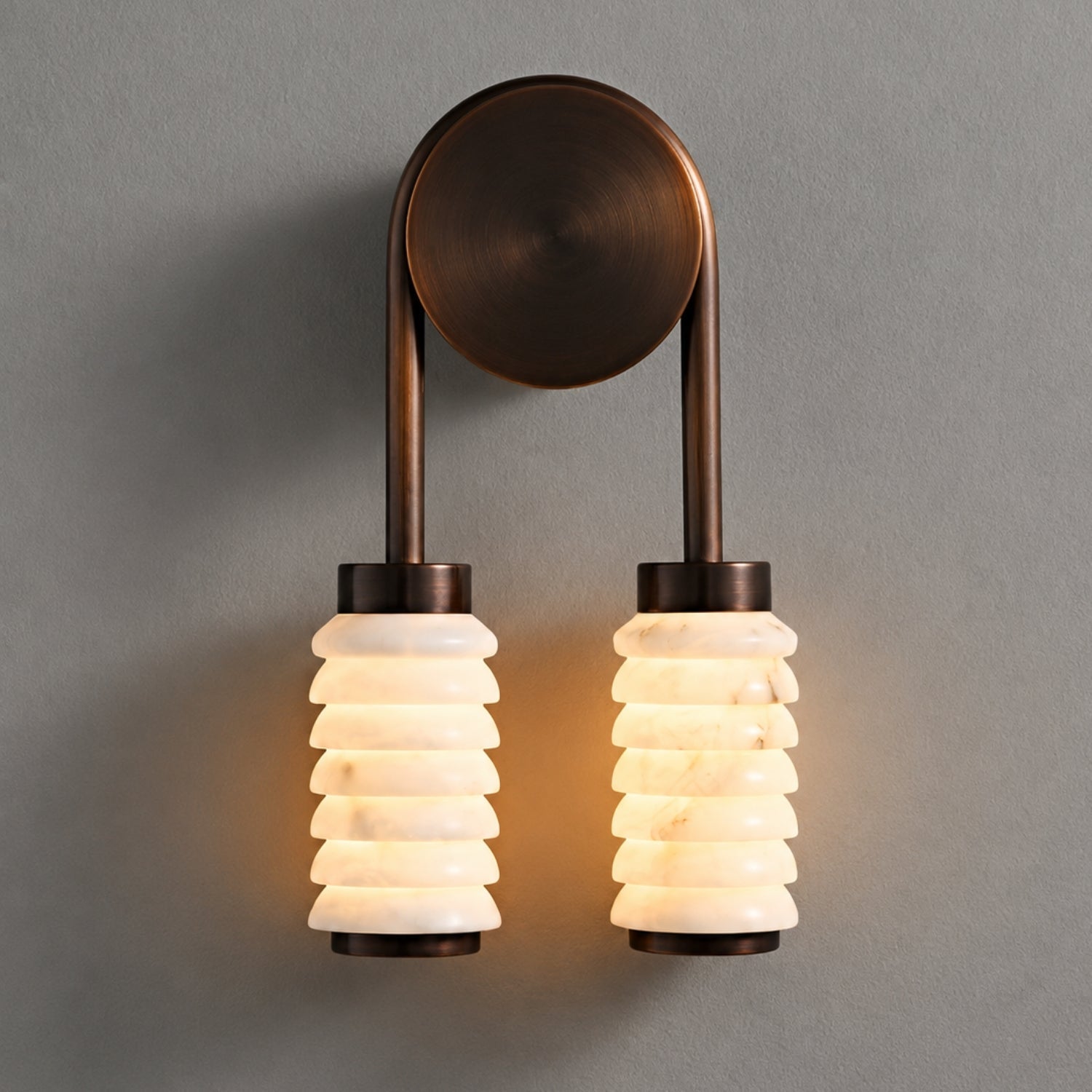 Wall lamp featuring elegant ribbed marble shades and a vintage antique metal frame, designed with a dual-light setup for a stylish and warm ambiance. 0