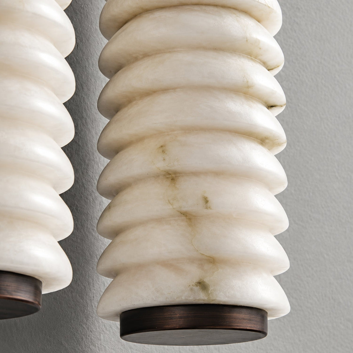 Wall lamp featuring elegant ribbed marble shades and a vintage antique metal frame, designed with a dual-light setup for a stylish and warm ambiance. 4