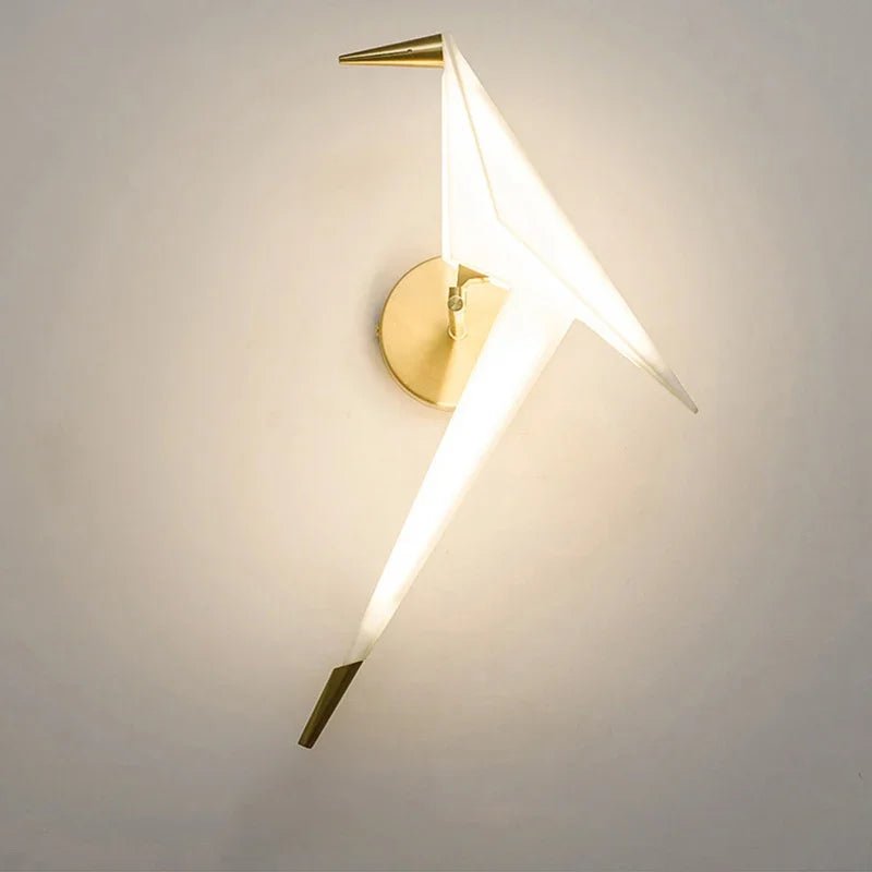 Wall lamp featuring warm LED lighting and a stylish matte gold finish, designed with a unique tap and paper motif, perfect for enhancing modern interiors. 0