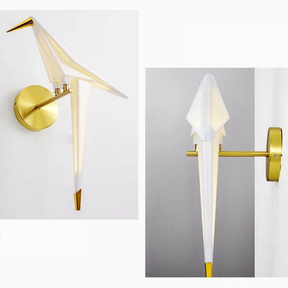 Wall lamp featuring warm LED lighting and a stylish matte gold finish, designed with a unique tap and paper motif, perfect for enhancing modern interiors. 3