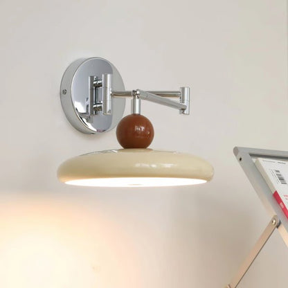 Modern minimalist wall light with adjustable arm, featuring a sleek metal and acrylic finish, perfect for contemporary home decor. 6