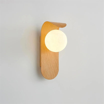 Wall light featuring a frosted globe and a wood look base, designed for compact spaces and damp-rated for both indoor and outdoor use. 9