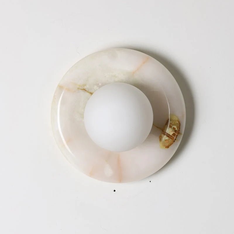 Wall light featuring a natural onyx backplate and a stylish glass globe, designed for hardwired indoor installation, perfect for enhancing home decor. 21