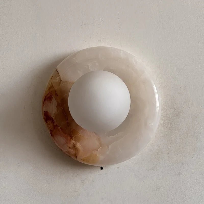 Wall light featuring a natural onyx backplate and a stylish glass globe, designed for hardwired indoor installation, perfect for enhancing home decor. 28
