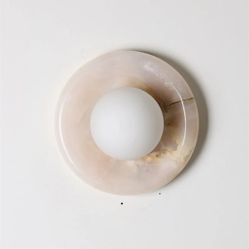 Wall light featuring a natural onyx backplate and a stylish glass globe, designed for hardwired indoor installation, perfect for enhancing home decor. 41