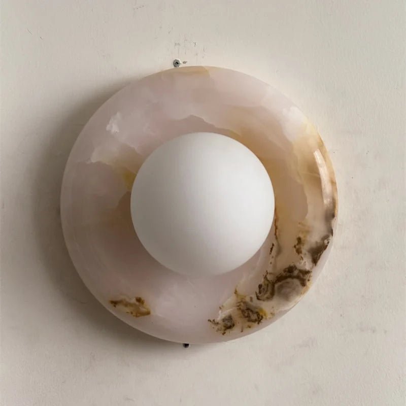 Wall light featuring a natural onyx backplate and a stylish glass globe, designed for hardwired indoor installation, perfect for enhancing home decor. 38