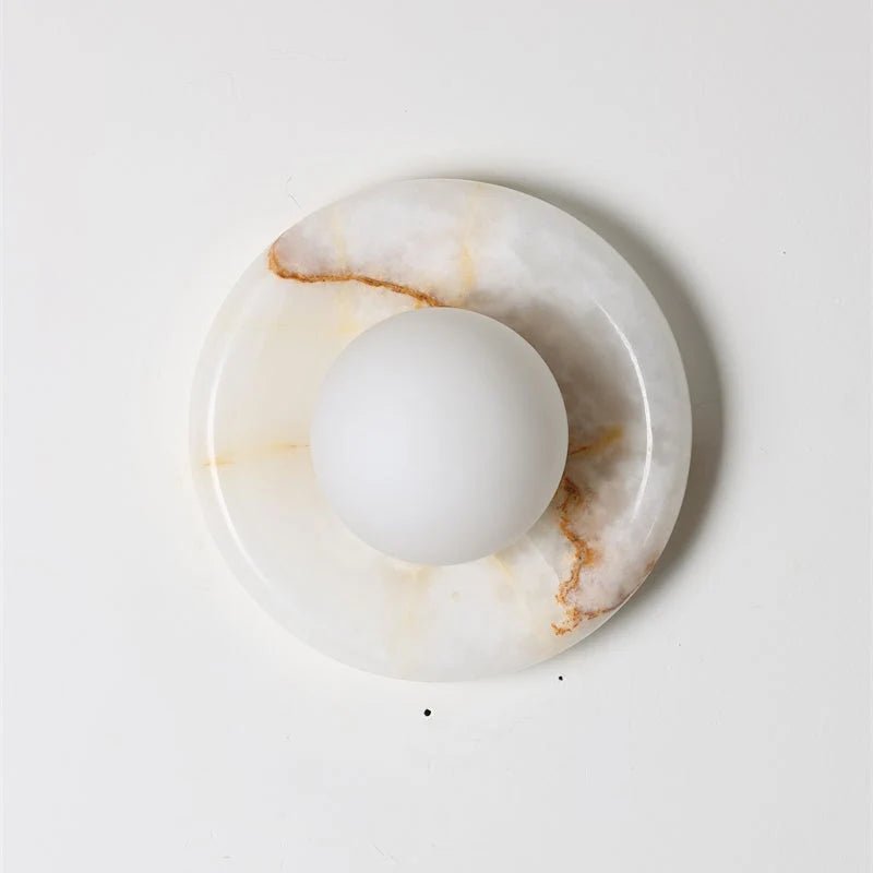Wall light featuring a natural onyx backplate and a stylish glass globe, designed for hardwired indoor installation, perfect for enhancing home decor. 15