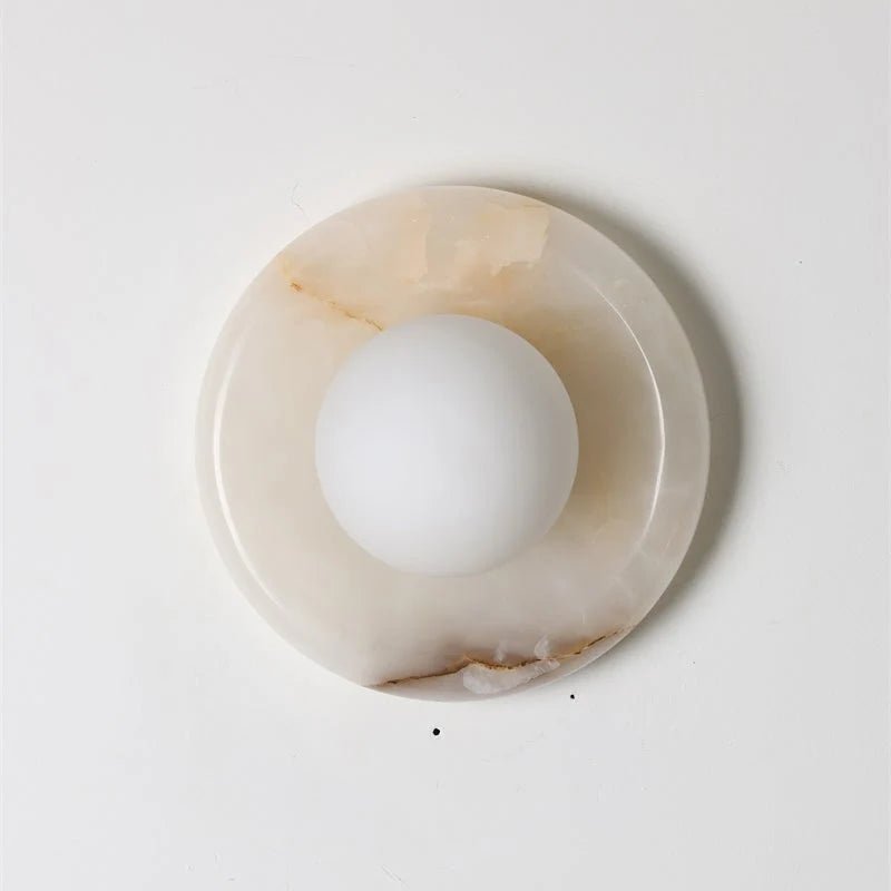 Wall light featuring a natural onyx backplate and a stylish glass globe, designed for hardwired indoor installation, perfect for enhancing home decor. 32