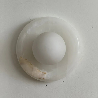 Wall light featuring a natural onyx backplate and a stylish glass globe, designed for hardwired indoor installation, perfect for enhancing home decor. 45