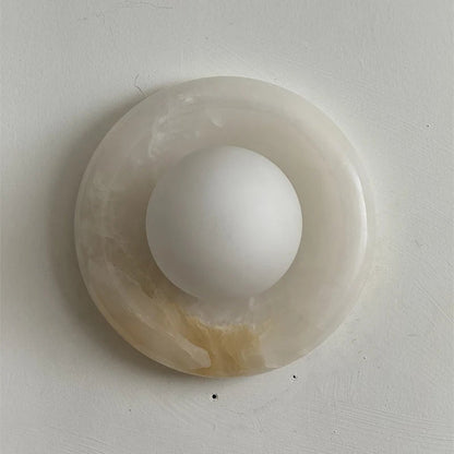 Wall light featuring a natural onyx backplate and a stylish glass globe, designed for hardwired indoor installation, perfect for enhancing home decor. 11