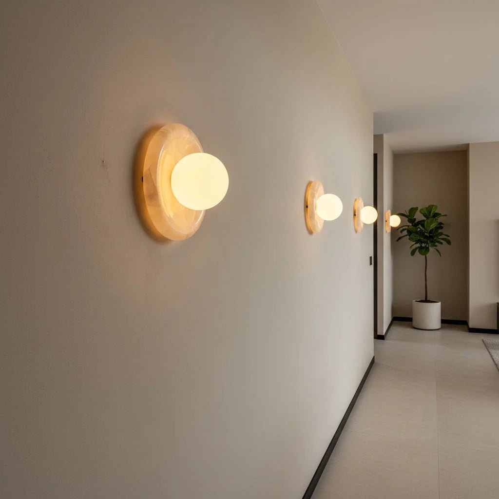 Wall light featuring a natural onyx backplate and a stylish glass globe, designed for hardwired indoor installation, perfect for enhancing home decor. 6