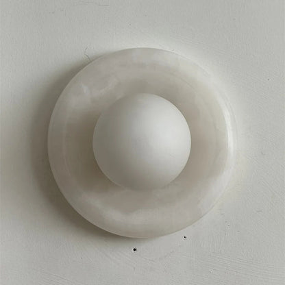 Wall light featuring a natural onyx backplate and a stylish glass globe, designed for hardwired indoor installation, perfect for enhancing home decor. 23