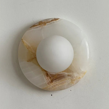 Wall light featuring a natural onyx backplate and a stylish glass globe, designed for hardwired indoor installation, perfect for enhancing home decor. 19