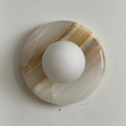 Wall light featuring a natural onyx backplate and a stylish glass globe, designed for hardwired indoor installation, perfect for enhancing home decor. 43